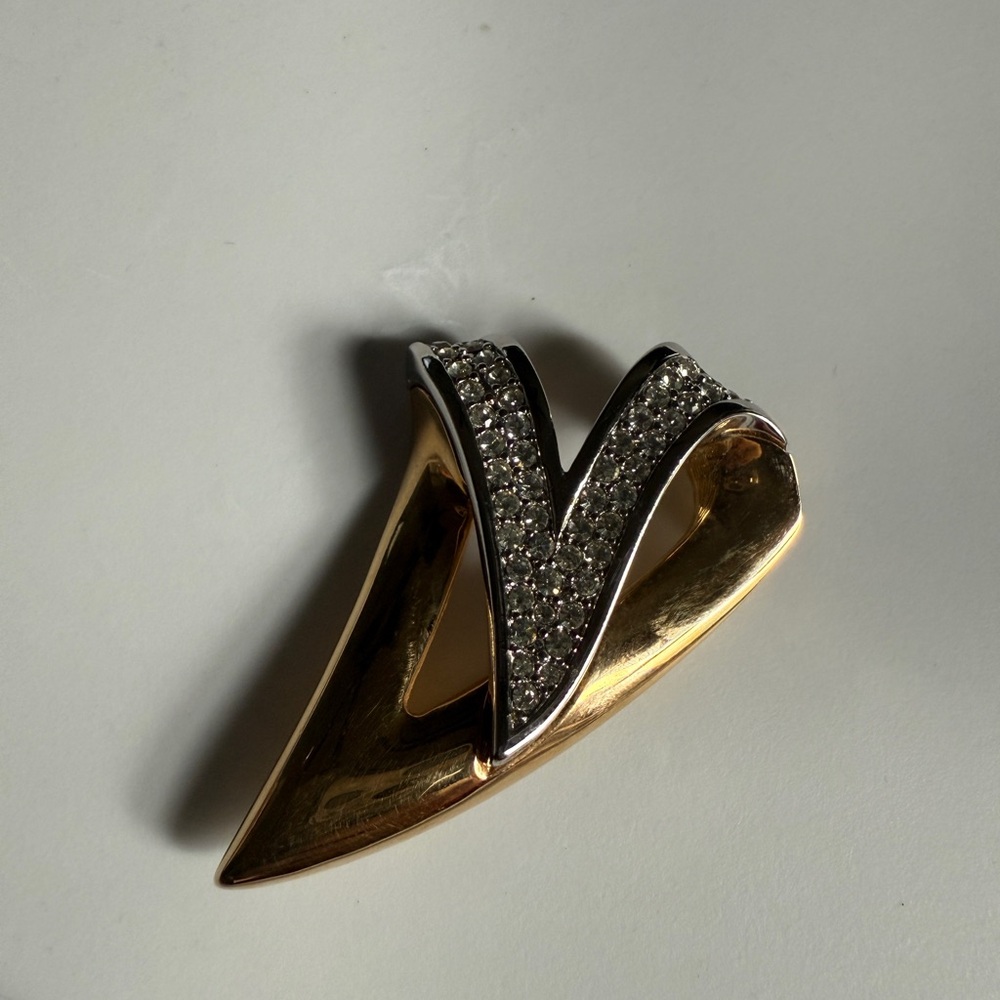 Elegant Gold and Silver Brooch with Crystal Accents